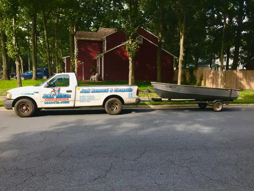 Junk Rescue Truck Dragging a Boat