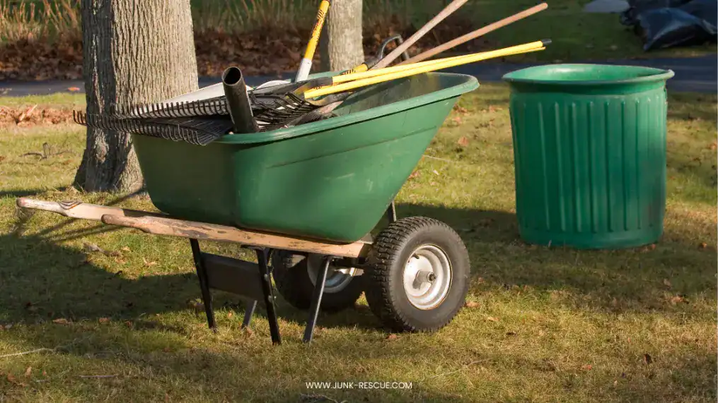 wheelbarrow and cleaning tools