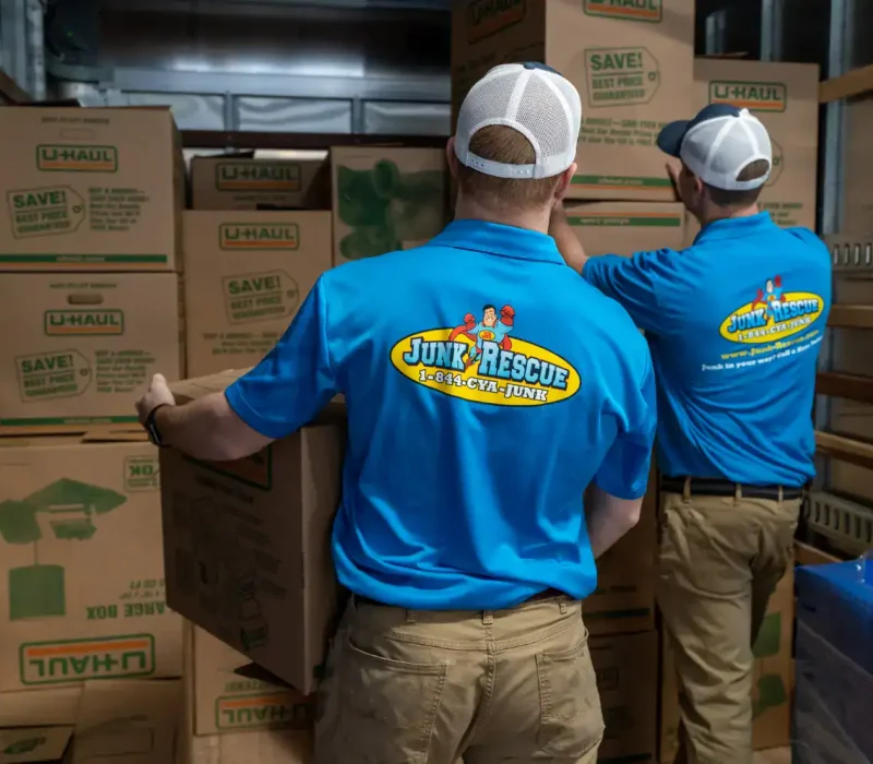 junk rescue crew removing cardboards